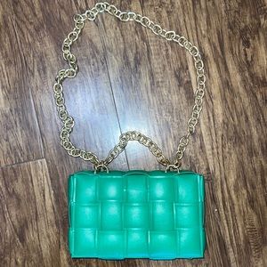 Green woven purse with gold chain